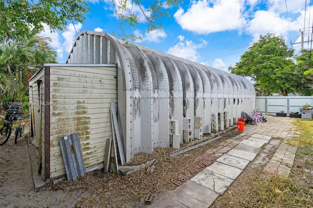 6645 Raleigh St, Hollywood, FL 33024 - exterior space featuring fence and an outbuilding