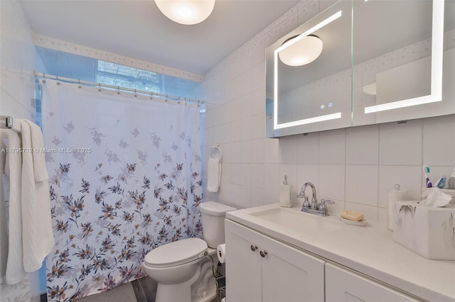 full bath with vanity, curtained shower, toilet, tile walls, and backsplash