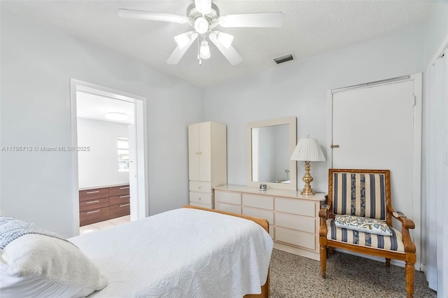 bedroom featuring ceiling fan and visible vents