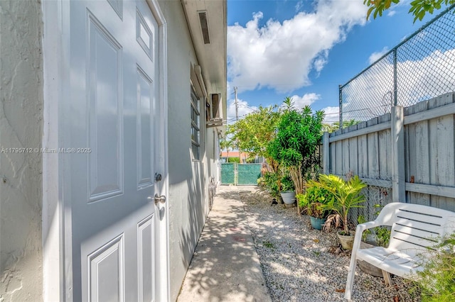 view of side of home with fence