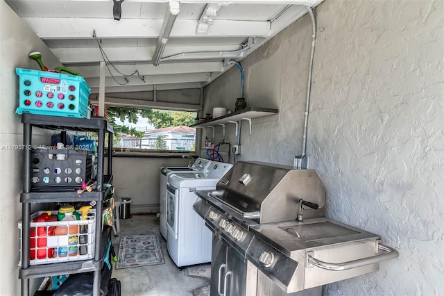 laundry area featuring laundry area and washing machine and dryer