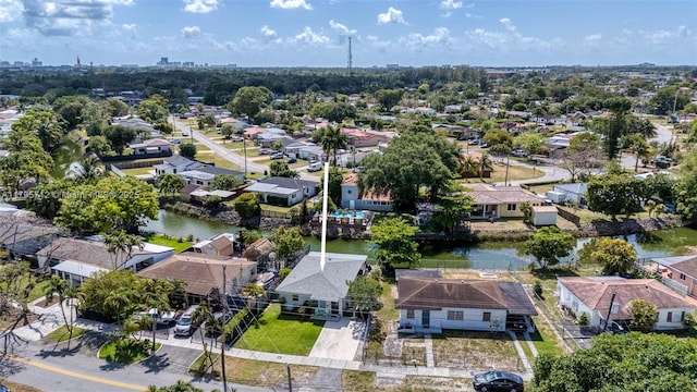aerial view featuring a water view and a residential view
