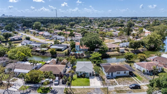 aerial view with a water view and a residential view