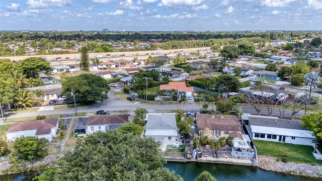 aerial view featuring a residential view and a water view