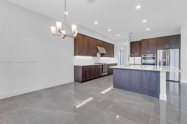 8215 Crystal Downs Ave, Boca Raton, FL 33434 - kitchen featuring stainless steel appliances, under cabinet range hood, a sink, light countertops, and recessed lighting