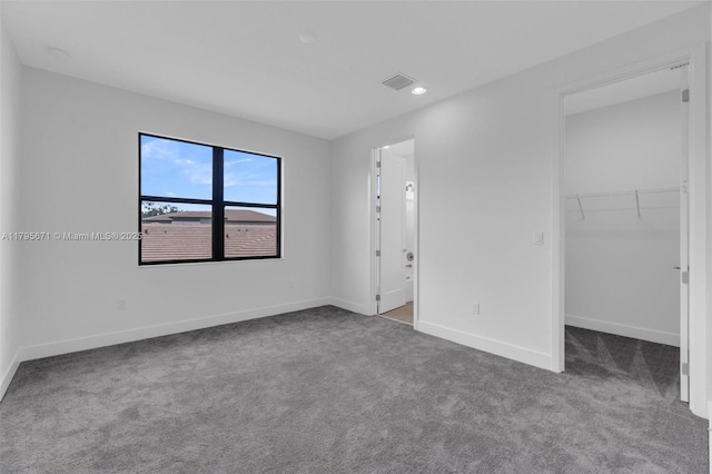 8215 Crystal Downs Ave, Boca Raton, FL 33434 - unfurnished bedroom with carpet flooring, baseboards, a spacious closet, and recessed lighting