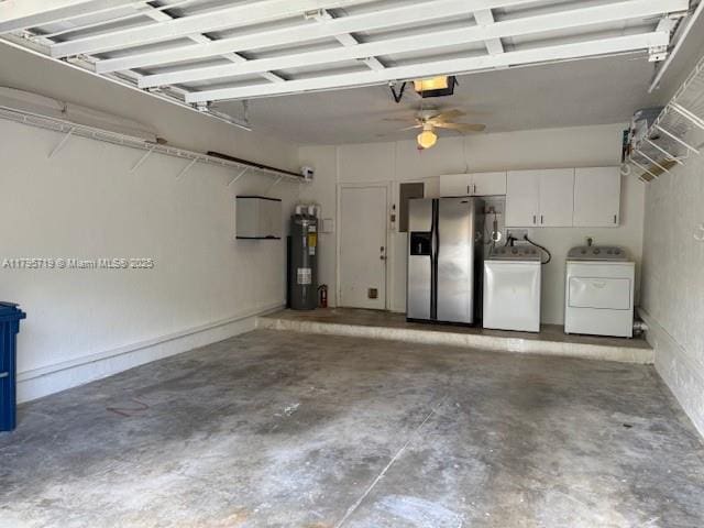 garage featuring ceiling fan, stainless steel refrigerator with ice dispenser, a garage door opener, washing machine and clothes dryer, and water heater