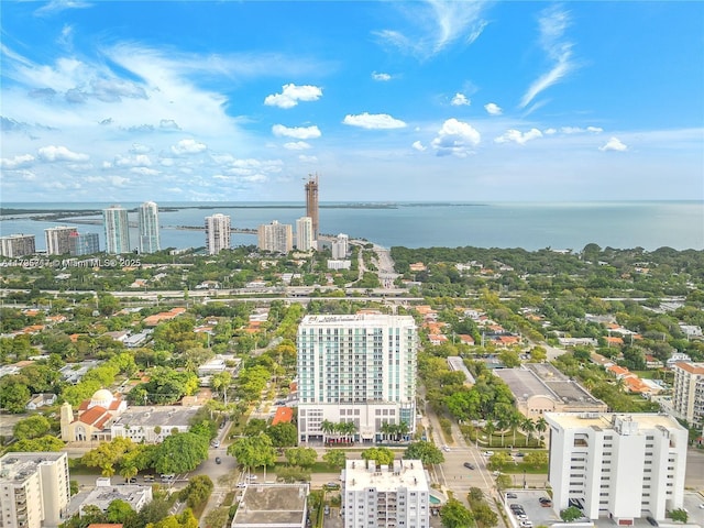 bird's eye view featuring a view of city and a water view