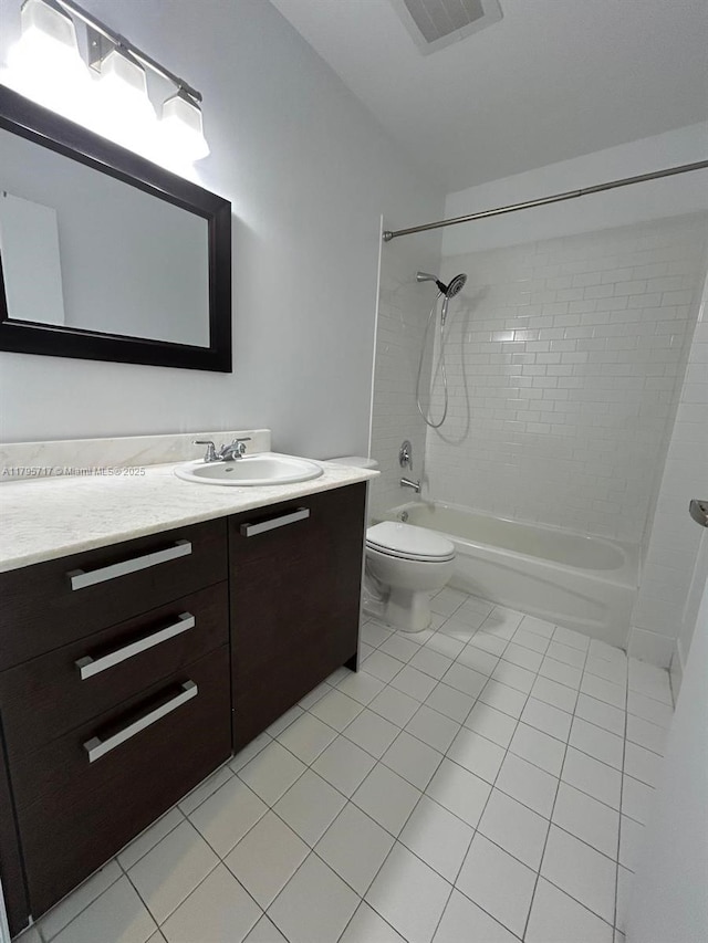 bathroom with tile patterned flooring, vanity, toilet, tub / shower combination, and visible vents