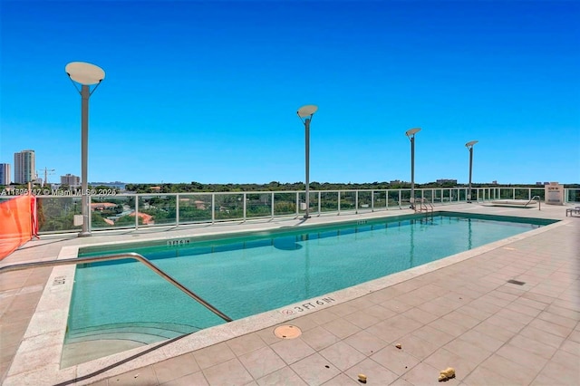 pool featuring fence