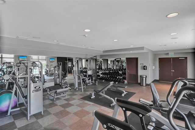 exercise room with recessed lighting