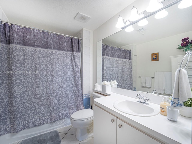 bathroom with visible vents, tile patterned flooring, shower / tub combo, vanity, and toilet