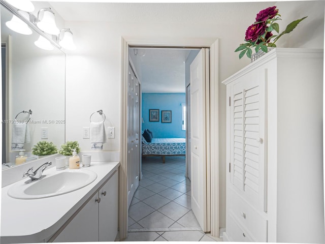 bathroom with vanity and tile patterned floors