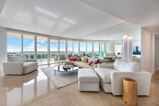 1000 S Pointe Dr Unit 1903, Miami Beach, FL 33139 - living room featuring a wall of windows