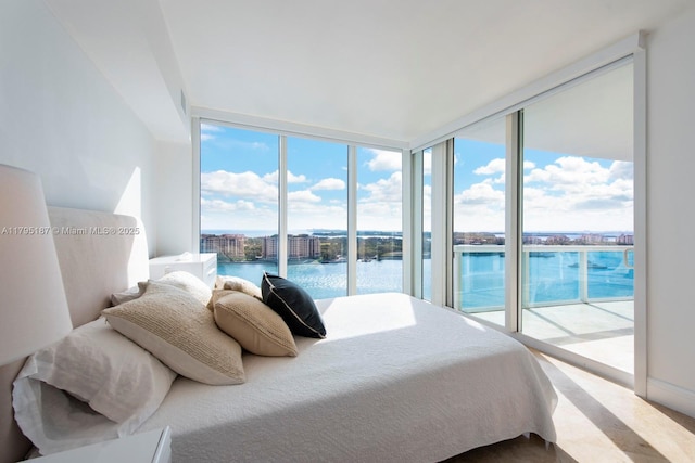 1000 S Pointe Dr Unit 1903, Miami Beach, FL 33139 - bedroom with a water view, floor to ceiling windows, and access to exterior