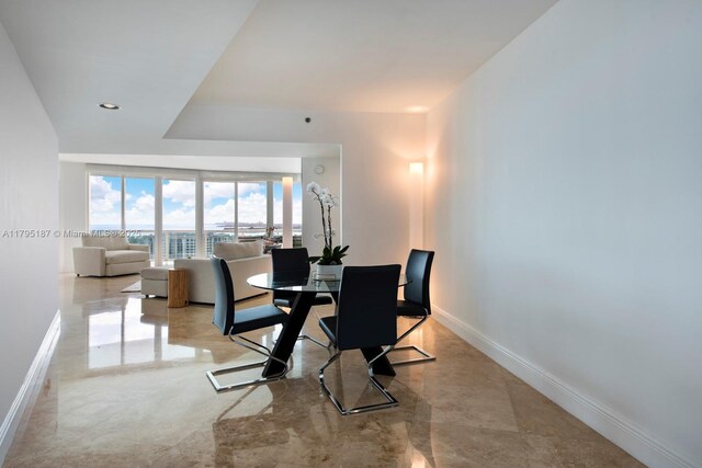 1000 S Pointe Dr Unit 1903, Miami Beach, FL 33139 - dining space with baseboards