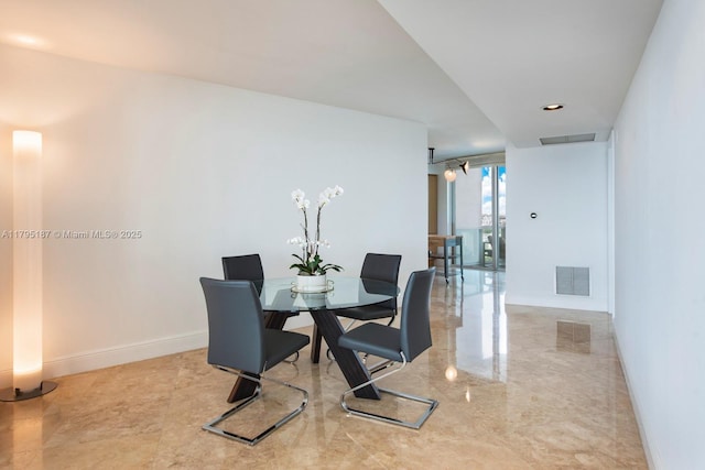 1000 S Pointe Dr Unit 1903, Miami Beach, FL 33139 - dining area with visible vents and baseboards