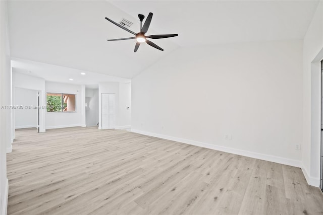 unfurnished living room with ceiling fan, visible vents, baseboards, lofted ceiling, and light wood-style floors