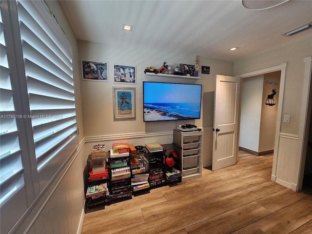 interior space with recessed lighting and wood finished floors