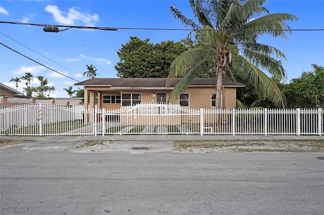 4241 W 1st Ave, Hialeah, FL 33012 - view of front of property featuring a fenced front yard