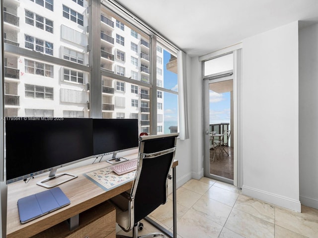 6039 Collins Ave Unit 1015, Miami Beach, FL 33140 - office space with baseboards and marble finish floor