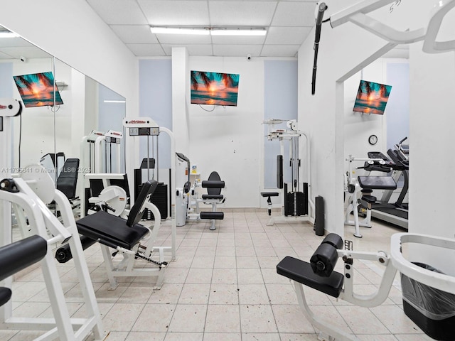 6039 Collins Ave Unit 1015, Miami Beach, FL 33140 - gym featuring a paneled ceiling