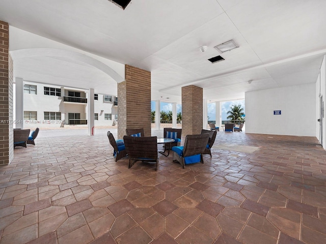 6039 Collins Ave Unit 1015, Miami Beach, FL 33140 - view of patio with outdoor dining space
