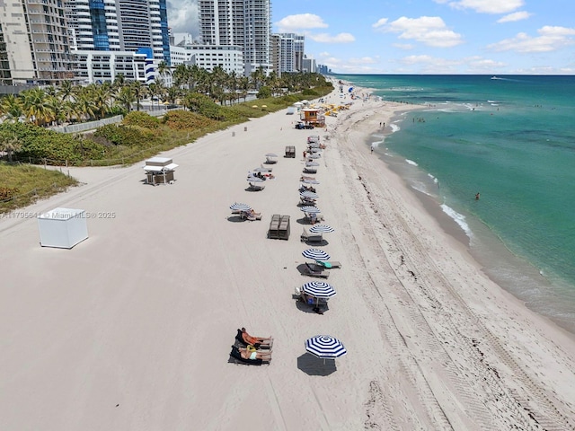 6039 Collins Ave Unit 1015, Miami Beach, FL 33140 - bird's eye view with a view of the beach and a water view