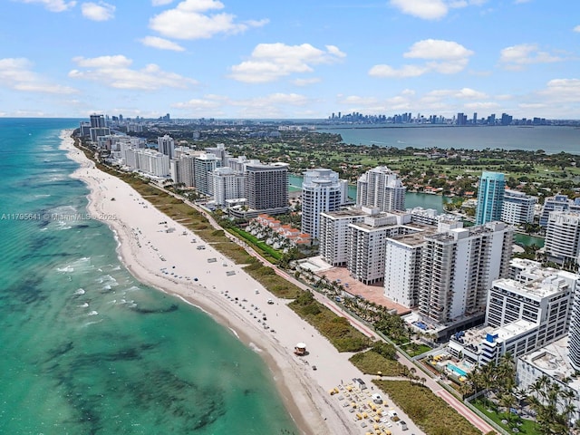 6039 Collins Ave Unit 1015, Miami Beach, FL 33140 - drone / aerial view featuring a beach view, a city view, and a water view