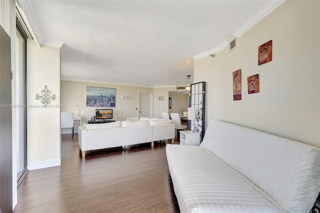 3300 NE 191st St Unit 07, Aventura, FL 33180 - living area featuring crown molding and dark wood-type flooring