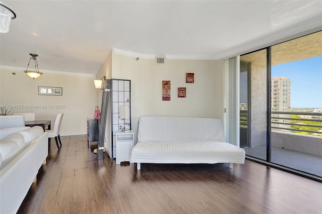 3300 NE 191st St Unit 07, Aventura, FL 33180 - living room featuring dark wood-style floors and crown molding