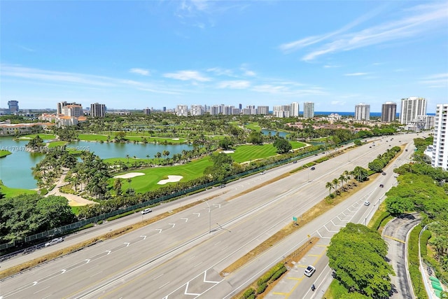 3300 NE 191st St Unit 07, Aventura, FL 33180 - drone / aerial view of a main thoroughfare, a skyline view, and a large body of water