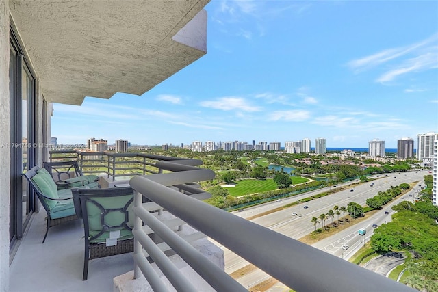 3300 NE 191st St Unit 07, Aventura, FL 33180 - balcony featuring a skyline view and a water view