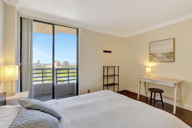 3300 NE 191st St Unit 07, Aventura, FL 33180 - bedroom featuring baseboards, dark wood-style flooring, ornamental molding, access to outside, and a view of city