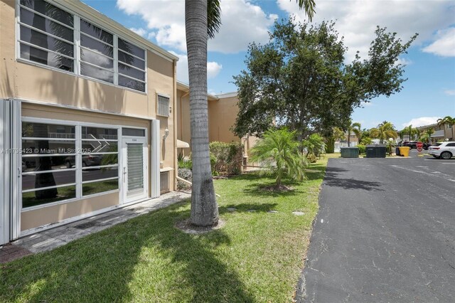 2164 NE 1st Way Unit 103, Boynton Beach, FL 33435 - view of green lawn