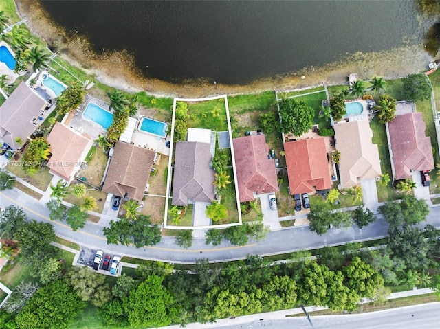 birds eye view of property with a residential view
