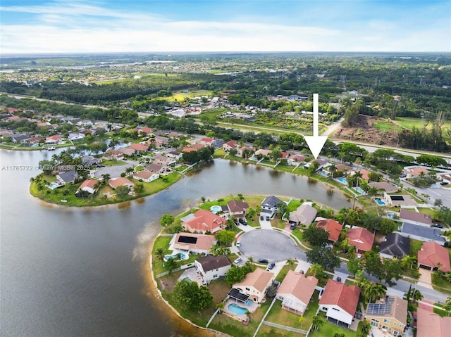 aerial view with a water view and a residential view