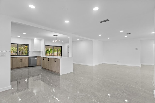 interior space with visible vents, recessed lighting, baseboards, and marble finish floor