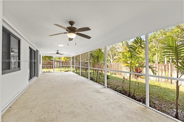 view of patio with a fenced backyard and ceiling fan