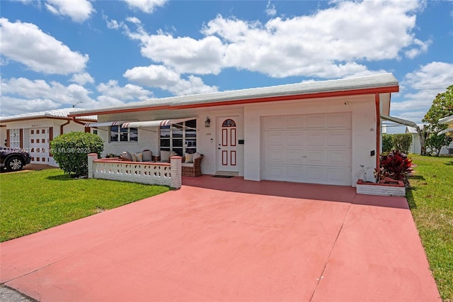 5803 NW 84th Ave, Tamarac, FL 33321 - view of front facade featuring driveway, a front lawn, and a garage