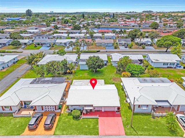 5803 NW 84th Ave, Tamarac, FL 33321 - drone / aerial view featuring a residential view