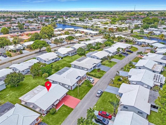 5803 NW 84th Ave, Tamarac, FL 33321 - birds eye view of property with a residential view and a water view