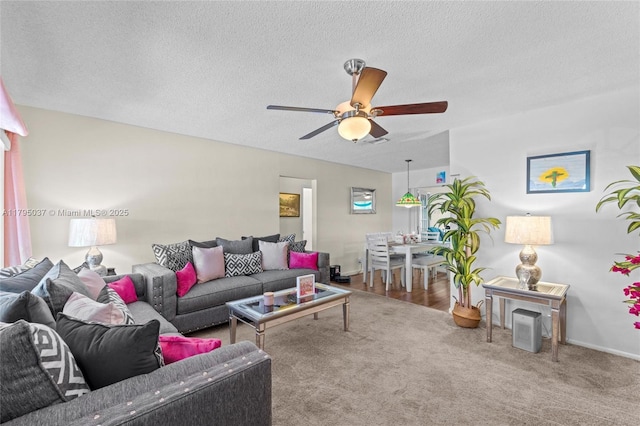 5803 NW 84th Ave, Tamarac, FL 33321 - carpeted living room with a textured ceiling, ceiling fan, and baseboards