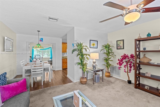 5803 NW 84th Ave, Tamarac, FL 33321 - sitting room with baseboards, ceiling fan, carpet flooring, and visible vents