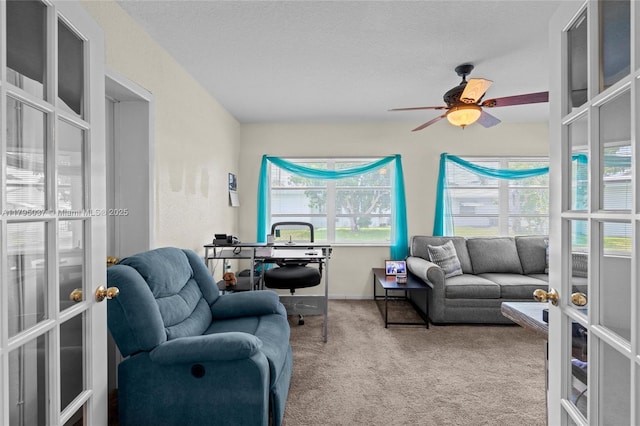 5803 NW 84th Ave, Tamarac, FL 33321 - living room featuring french doors, carpet flooring, baseboards, and a ceiling fan