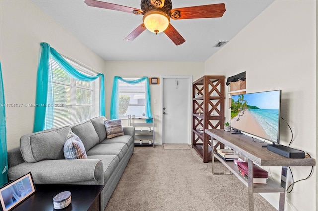 5803 NW 84th Ave, Tamarac, FL 33321 - carpeted living room with visible vents and a ceiling fan