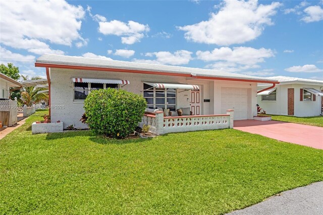 5803 NW 84th Ave, Tamarac, FL 33321 - view of front of property featuring brick siding, a garage, driveway, and a front yard