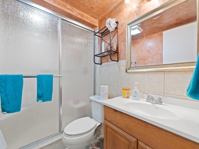 21121 SW 85th Ave Unit 202, Cutler Bay, FL 33189 - bathroom with vanity, toilet, tile walls, a shower stall, and tasteful backsplash