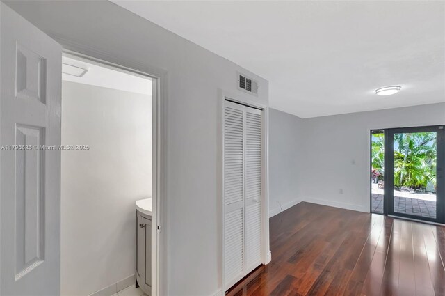 1901 NW S River Dr Unit 14-B, Miami, FL 33125 - interior space featuring wood finished floors and baseboards
