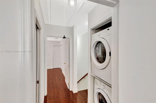 1901 NW S River Dr Unit 14-B, Miami, FL 33125 - laundry area with stacked washer / dryer, attic access, and dark wood-style floors